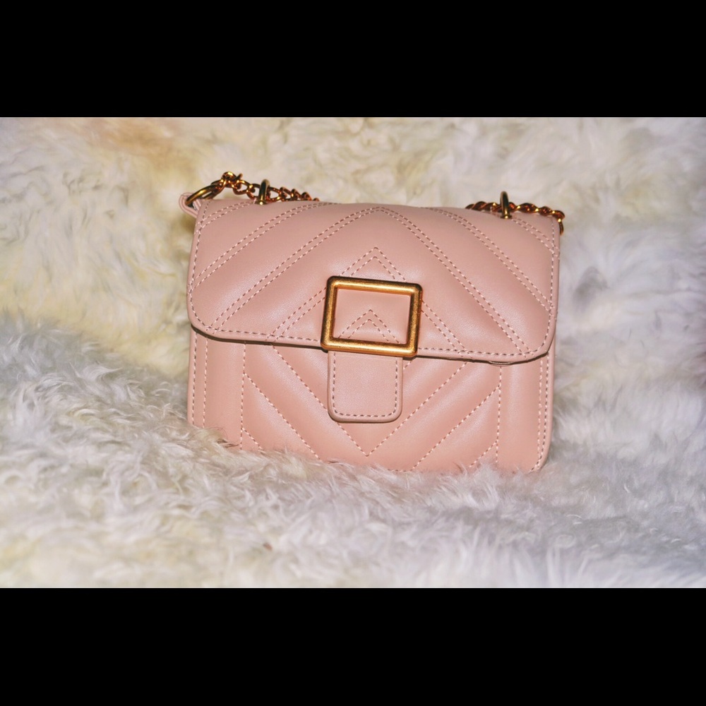 Pale pink clutch crossbody bag